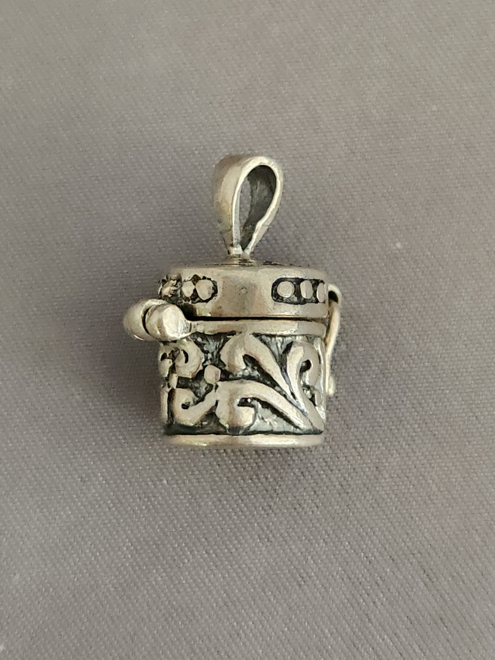 Ornate Silver Talisman Keepsake Pendant with Floral Motif